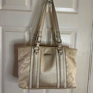 Dana Buchman beige canvas and faux leather trims and accents shoulder bag.